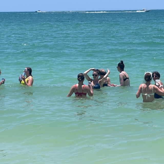 A bachelorette group celebrating on a boat in Naples, Florida
