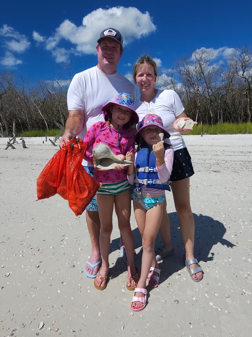 A family aboard a Sand Dollar boat tour near Marco Island