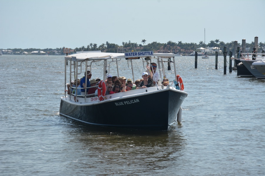 A Naples water shuttle versus city traffic, Florida